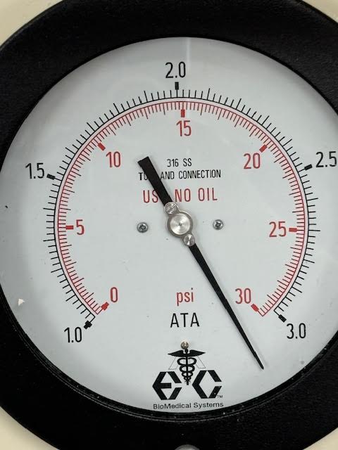 Close-up of a pressure gauge measuring up to 30 psi.