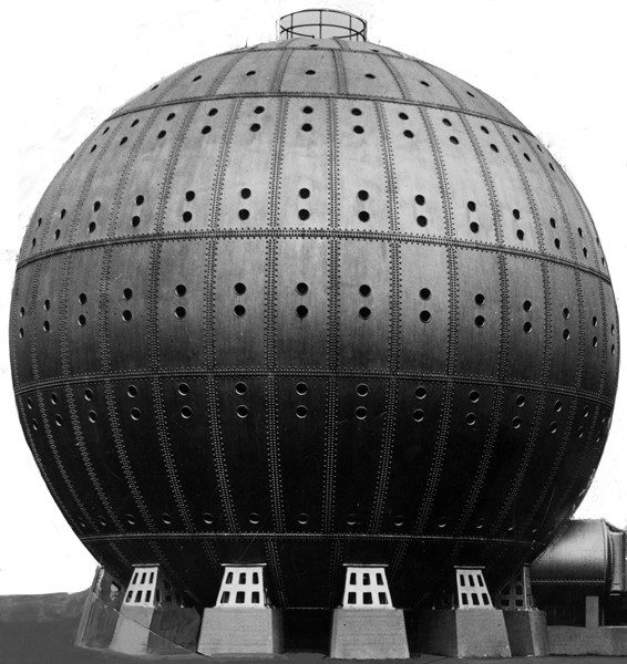 A large spherical building with a perforated metal facade.