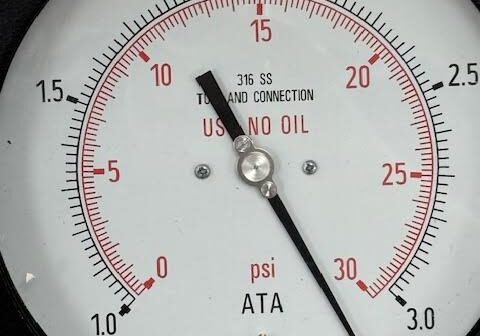 Close-up of a pressure gauge measuring up to 30 psi.